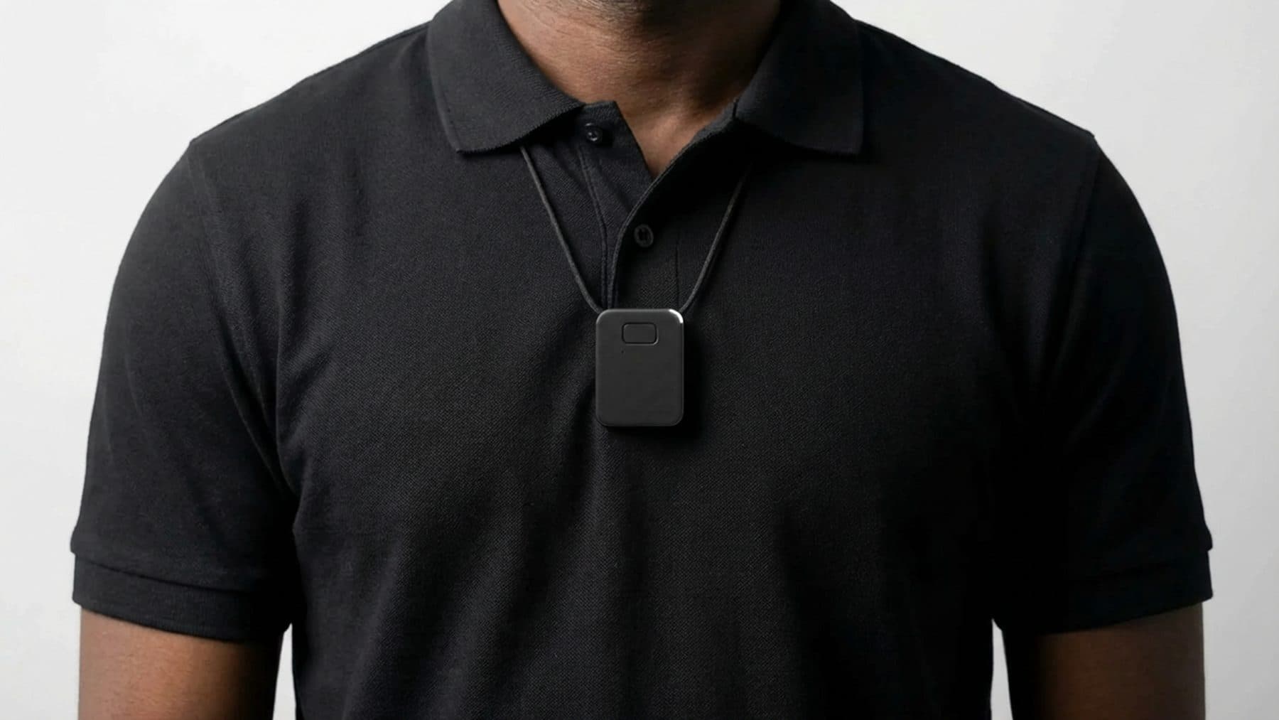 The Parlay Chip worn on a lanyard over a black t-shirt
